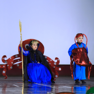 Child performing on stage during Annual Day at The Nurtuary Preschool, Sector 20, Panchkula