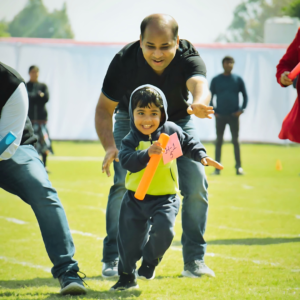 Parent and child participating in sports activity at The Nurtuary Preschool, Sector 20 Panchkula