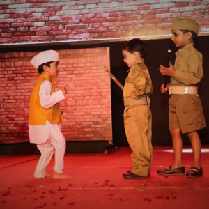 A child in playgroup age performing at The Nurtuary Preschool's Annual Day event in Sector 20, Panchkula.