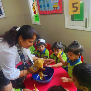 Storytelling session with props at The Nurtuary Preschool, a Kidzee preschool near me in Sector 20 Panchkula.