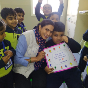 Children presenting thank you cards to support staff at The Nurtuary Preschool Sector 20 Panchkula
