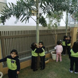 Kids Hugging Trees Outdoor Activity at The Nurtuary Preschool in Sector 20, Panchkula