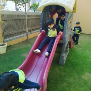 Children playing freely in the outdoor area at The Nurtuary Preschool, Sector 20 Panchkula, showcasing a vibrant learning environment.